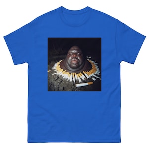 Gumbo Slice Funny Meme T-Shirt | Black Guy in Swamp Surrounded by Cigarettes | Viral Humor Tee | Unique Meme Merch
