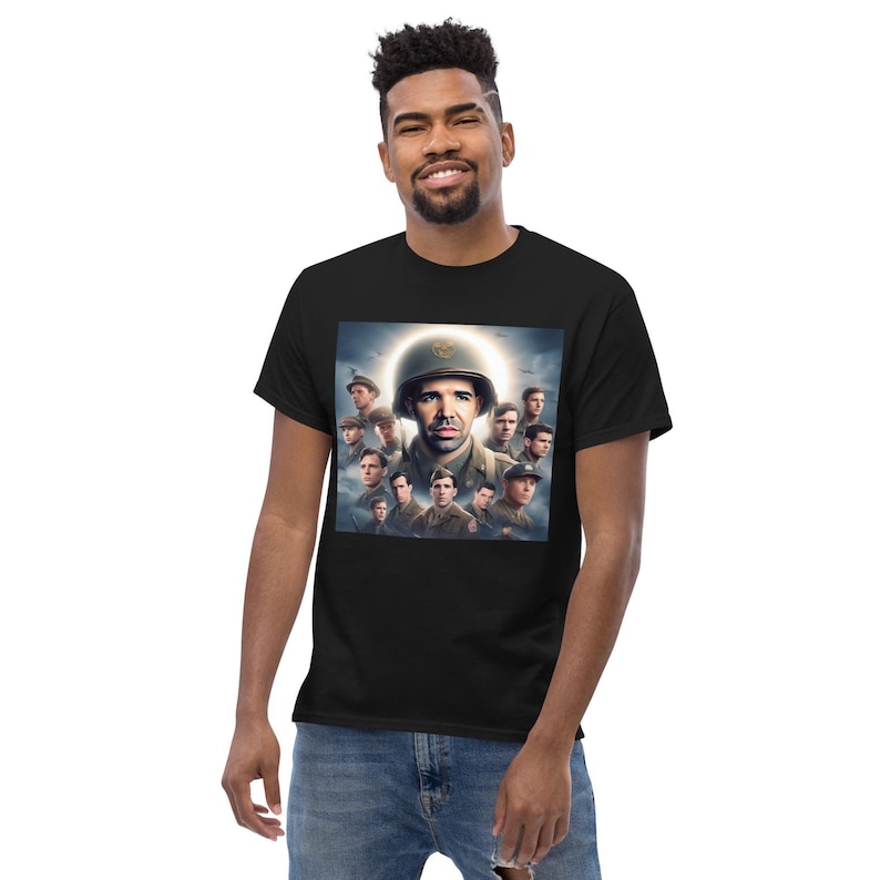 May include: Black t-shirt featuring a graphic of a man in a military helmet surrounded by other men in military uniforms. The graphic has a halo effect around the man's head. The t-shirt is made of a soft, comfortable material.