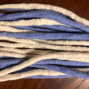 10 DE 12-14” baby blue/white wool dread extensions