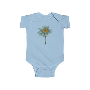 May include: A light blue baby onesie with a blue flower with a yellow center.