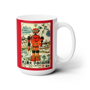 May include: White ceramic mug featuring a vintage Japanese robot illustration on a red background. The colorful design includes a retro robot, text, and various scenes. The mug has a large handle and is suitable for hot or cold beverages.