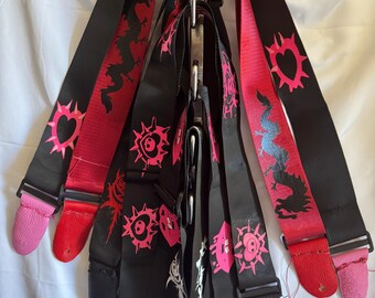 Guitar Straps, various designs, various colors ,  nylon durable webbing, vinyl art ,real leather ends, 62",  adjustable belt.