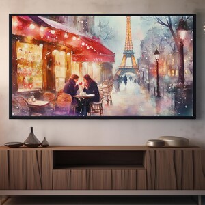 May include: A watercolor painting of a couple sitting at a cafe in Paris, France. The Eiffel Tower is in the background, and the cafe is decorated with Christmas lights. The painting is done in a romantic style, with soft colors and a dreamy atmosphere.