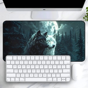 May include: A black and white wolf couple standing in a forest under a full moon. The wolves are looking at each other and the moon is shining brightly in the night sky.