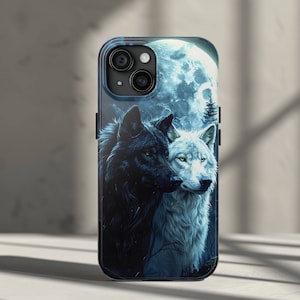 May include: A black and white wolf phone case with a full moon in the background. The case is designed for an iPhone.