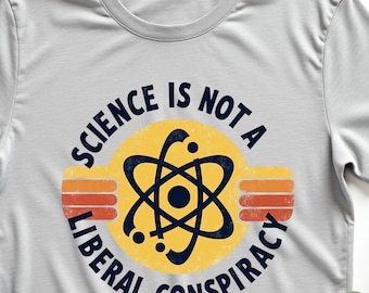 Camiseta política retro "La ciencia no es una conspiración liberal", camiseta gráfica vintage de activista, a favor de la ciencia, los hechos sobre la ficción para hombres y mujeres.