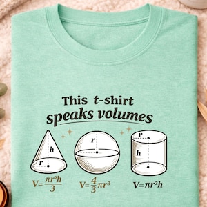 May include: A mint green t-shirt with the phrase "This t-shirt speaks volumes" and volume formulas. The design includes diagrams of a cone, sphere, and cylinder, each with its formula. The word "Mint" is written in cursive.