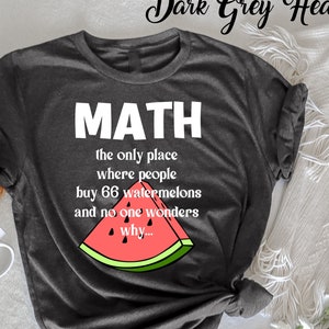 May include: Dark grey heather t-shirt with a watermelon graphic and the text "MATH the only place where people buy 66 watermelons and no one wonders why..."