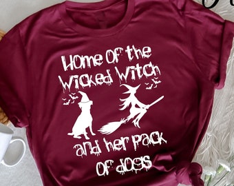 Home Of The Wicked Witch And Her Pack Of Dog T-Shirt, Funny Halloween T-Shirt,  Halloween Party Gift, Spooky Season Shirt, Halloween Witch