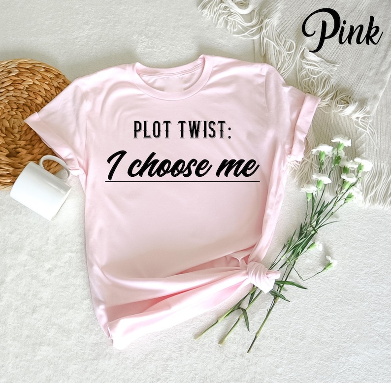 A bold "Plot Twist I Choose Me" t-shirt that celebrates self-love and empowerment. Perfect for anyone embracing confidence, personal growth, and choosing themselves. Comfortable cotton tee for daily wear and motivation.