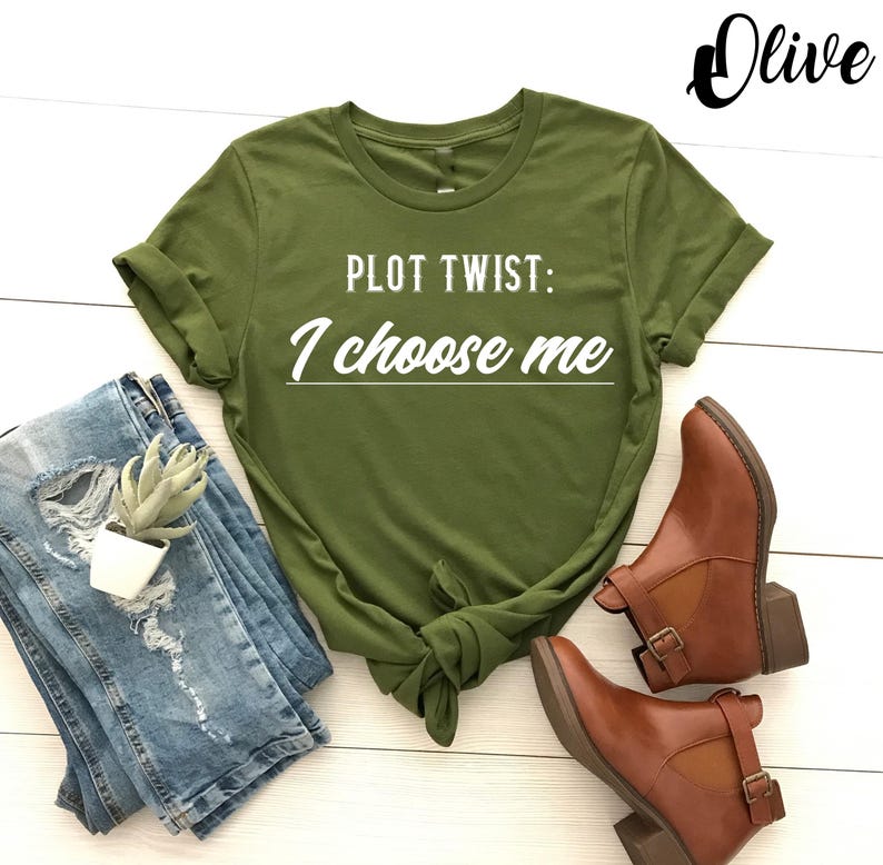 May include: A green t-shirt with the text "Plot Twist: I choose me" in white lettering.