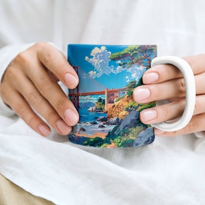 May include: A white ceramic mug featuring a colourful image of the Golden Gate Bridge in San Francisco, California.