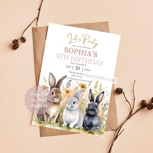 May include: A birthday party invitation featuring three watercolor bunnies in a field of flowers. The invitation reads "Let's Party" and announces "Sophia's 5th Birthday" on November 21st at 3 PM. The invitation is on a white background.