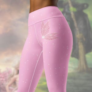 May include: Pink leggings with a white butterfly design and a white polka dot pattern.