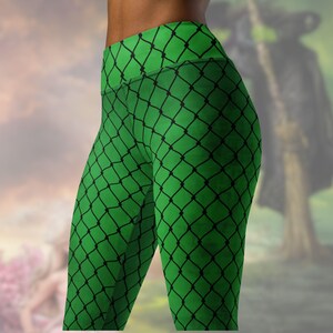 May include: Bright green leggings with a black net pattern. The high-waisted leggings are made of a stretchy material and are designed for comfort and flexibility. The net design adds a unique visual texture to the leggings.