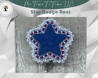 Orecchini in argilla con perline: ciondolo a forma di stella blu in rilievo, con decorazioni indigene.