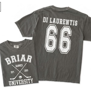 May include: Two gray t-shirts. One shirt has "BRIAR HAWKS UNIVERSITY" with crossed hockey sticks and a puck. The other shirt has "DI LAURENTIS 66" on the back. Both shirts have white lettering.