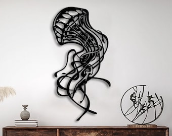 May include: A black metal wall sculpture of a stylized jellyfish with intricate details. The sculpture is mounted on a white wall above a wooden dresser with two drawers. The dresser is in a living room setting with a coffee table and two chairs.