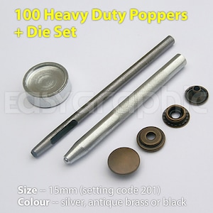 May include: A set of 100 heavy duty poppers with a die set for attaching them to fabric. The poppers are 15mm in size and come in silver, antique brass, or black. The set includes two tools for setting the poppers.