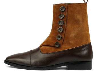 May include: Brown leather ankle boots with a suede panel on the upper part of the boot. The suede panel has a row of six decorative buttons.