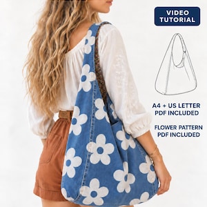 May include: A blue denim hobo bag featuring a white flower pattern. The image includes text: DENIM HOBO BAG, PDF SEWING PATTERN, VIDEO TUTORIAL, A4 + US LETTER PDF INCLUDED, FLOWER PATTERN PDF INCLUDED, and STEP-BY-STEP PHOTO TUTORIAL.