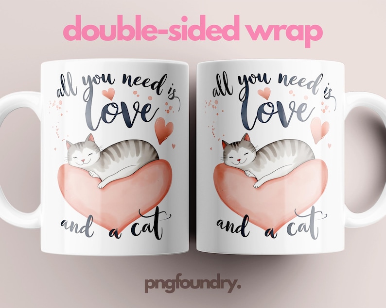 May include: White ceramic coffee mug with a pink heart and a sleeping cat illustration. The text on the mug reads "All you need is love and a cat."