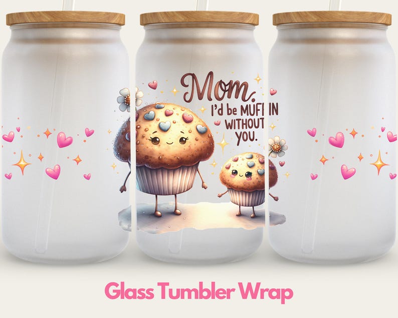 May include: A set of three white glass tumblers with a wood lid and a straw. The tumblers are decorated with a pink and white heart pattern, a cartoon cupcake with a pink frosting and sprinkles, and the text "Mom, I'd be mufin without you."