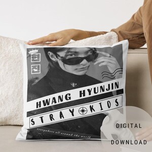 May include: Black and white photograph of a man wearing sunglasses and a black jacket. The text "HWANG HYUNJIN STRAY KIDS" is printed on the image. The text "everywhere all around the world" is printed at the bottom of the image.