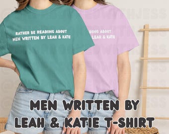 Rather be reading about men written by Leah & Katie T-Shirt