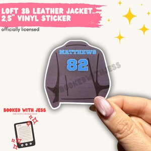 May include: A 2.5-inch vinyl sticker featuring a gray leather jacket design with the name "MATTHEWS" and the number "82" in blue. The sticker is officially licensed and includes the text "LOFT 3B LEATHER JACKET" and "BOOKED WITH JESS".