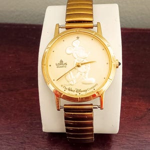 Lorus by Seiko Y481-1720 RO Gold Coin Watch.