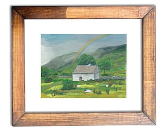 An Irish Cottage and Rainbow