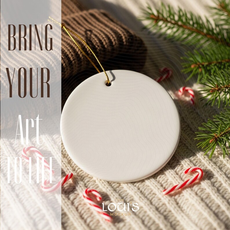 May include: A white, round ceramic ornament with a gold string, resting on a cream-colored knitted surface. The text "BRING YOUR ART TO LIFE" is visible. Candy canes and a sprig of evergreen add a festive touch. The image is a mockup from Louis Mockups.