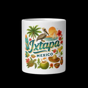 May include: White ceramic mug featuring a colorful design with the text "Ixtapa Mexico". The design includes a pelican, palm trees, a surfboard, fish, a turtle, a coconut, a sombrero, and other tropical elements.