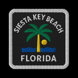 May include: Embroidered patch featuring the words "Siesta Key Beach Florida" in white. The design includes a palm tree, sun, and waves in green, yellow, and blue on a black background, with a white border.