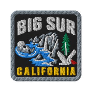 May include: A square embroidered patch with a black background and a gray border. It features the white text BIG SUR at the top and CALIFORNIA in yellow at the bottom. The center depicts a blue waterfall, gray rocks, a green tree, and a white bird.