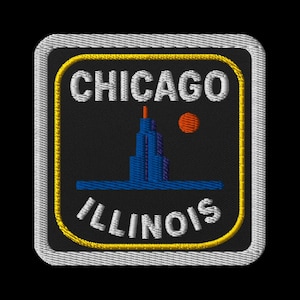 May include: Embroidered patch featuring the city name "CHICAGO" above "ILLINOIS". The design includes a blue skyscraper, an orange sun, and a yellow border. The patch has a black background and a white border.