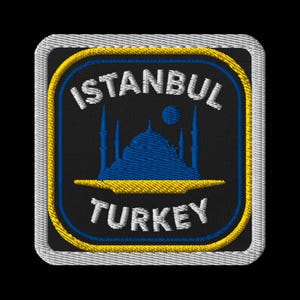 May include: Embroidered patch featuring the city name "ISTANBUL" above "TURKEY". The design includes a blue silhouette of a mosque with minarets, set against a black background, framed by a yellow and white border.