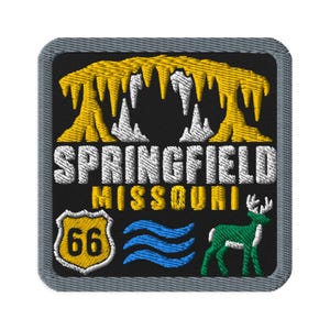 May include: A square embroidered patch with a black background and a gray border. It features yellow and white stalactites, the text SPRINGFIELD MISSOURI in white and yellow, a yellow Route 66 shield, blue wavy lines, and a green deer silhouette.