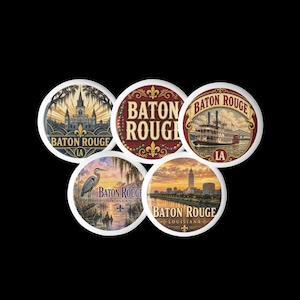 May include: Five circular magnets featuring Baton Rouge, Louisiana imagery. Designs include a cathedral, the text Baton Rouge with beads, a riverboat, a heron in a swamp at sunset, and the city skyline at dusk, all with fleur-de-lis accents.