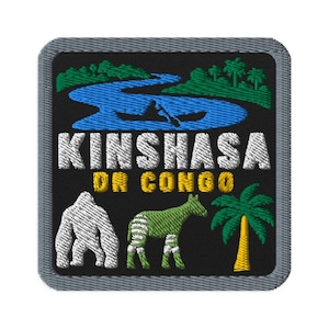 May include: A square embroidered patch with a gray border on a black background. It features a blue river with a canoe, green trees, and the white text KINSHASA and yellow text DR CONGO. Below are a white gorilla, a green okapi, and a palm tree.
