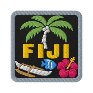 May include: A square embroidered patch with a black background and a grey border. It features a green palm tree, the yellow text FIJI, a small blue fish, a brown outrigger canoe, and a pink hibiscus flower with a yellow stamen.