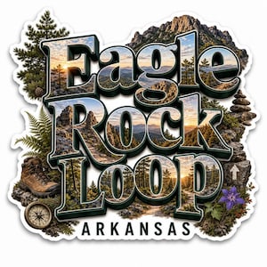 May include: A die-cut sticker featuring the text Eagle Rock Loop Arkansas in bold, dark-bordered letters filled with a scenic mountain landscape at sunset. The design includes a brown hiking boot, a compass, pine trees, ferns, and a purple flower.