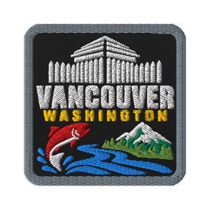 May include: A square embroidered patch with a grey border on a black background. It features a white building, the text VANCOUVER in white, WASHINGTON in yellow, a red fish jumping from blue water, and a green mountain with a white snow-capped peak.