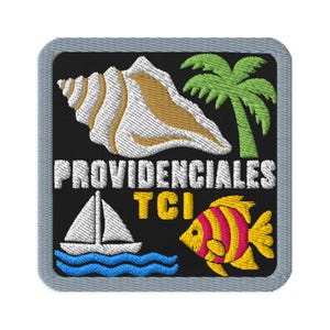 May include: A square embroidered patch with a black background and a gray border. It features a white and tan seashell, a green palm tree, a white sailboat on blue waves, and a yellow and pink fish. The text reads PROVIDENCIALES TCI in white.