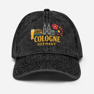 May include: Black baseball cap with a distressed finish. The cap features a colorful graphic of Cologne, Germany, including a beer stein, bridge, cathedral, and the city's name in yellow text.