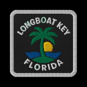 May include: Embroidered patch featuring a palm tree, sun, and water, with the text "LONGBOAT KEY FLORIDA" in white. The patch has a black background and a white border. The design is a square shape.