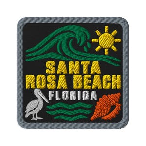 May include: A square embroidered patch with a black background and a gray border. It features a green ocean wave, a yellow sun, a white pelican, an orange seashell, and yellow text reading SANTA ROSA BEACH with white text reading FLORIDA.