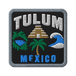 May include: A square embroidered patch with a black background and a gray border. It features the white text TULUM at the top and MEXICO in blue at the bottom. The center displays a tan pyramid, a green palm tree, a blue wave, and green foliage.