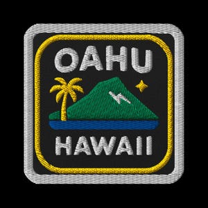 May include: Embroidered patch with the words "OAHU HAWAII" in white. It features a palm tree, mountain, and star design. The patch has a black background with yellow and white borders.